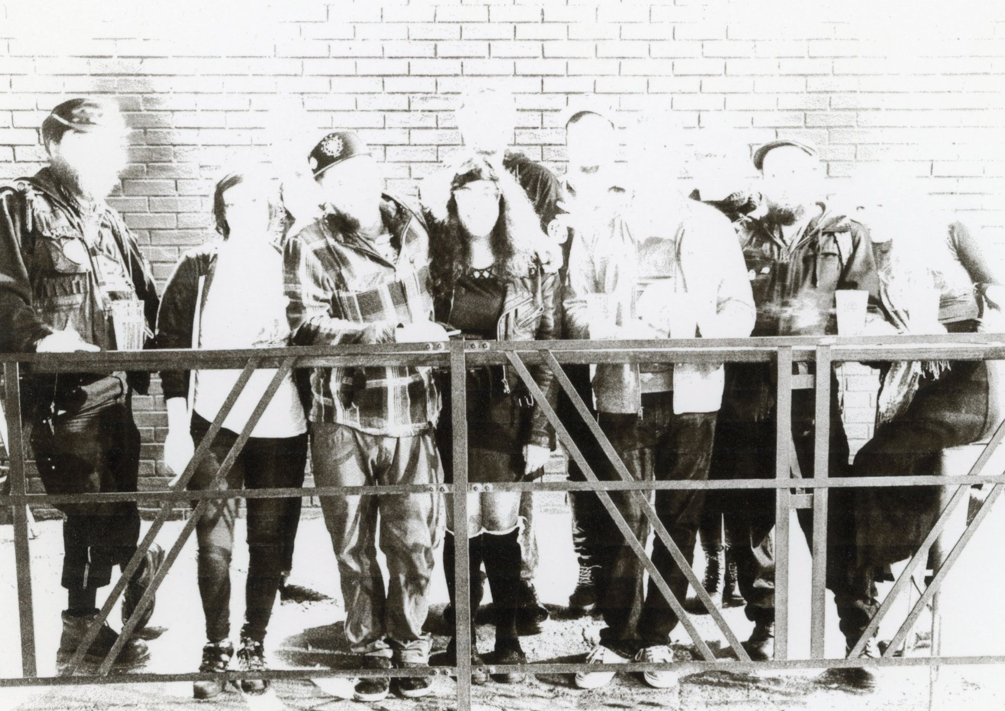 Corvus and Company staff and regulars on the patio, Capitol Hill, Seattle. A great photo printed terrible. Bad ink, blown highlights, indistinguishable faces. I love it.